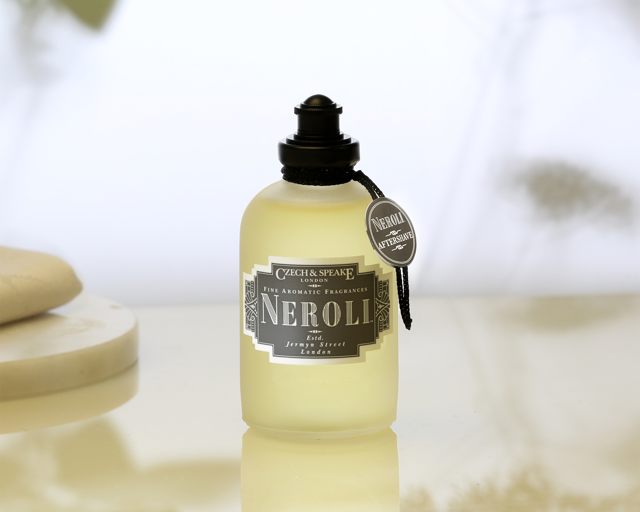 Neroli Aftershave Shaker 50ml by Czech & Speake in summer scene
