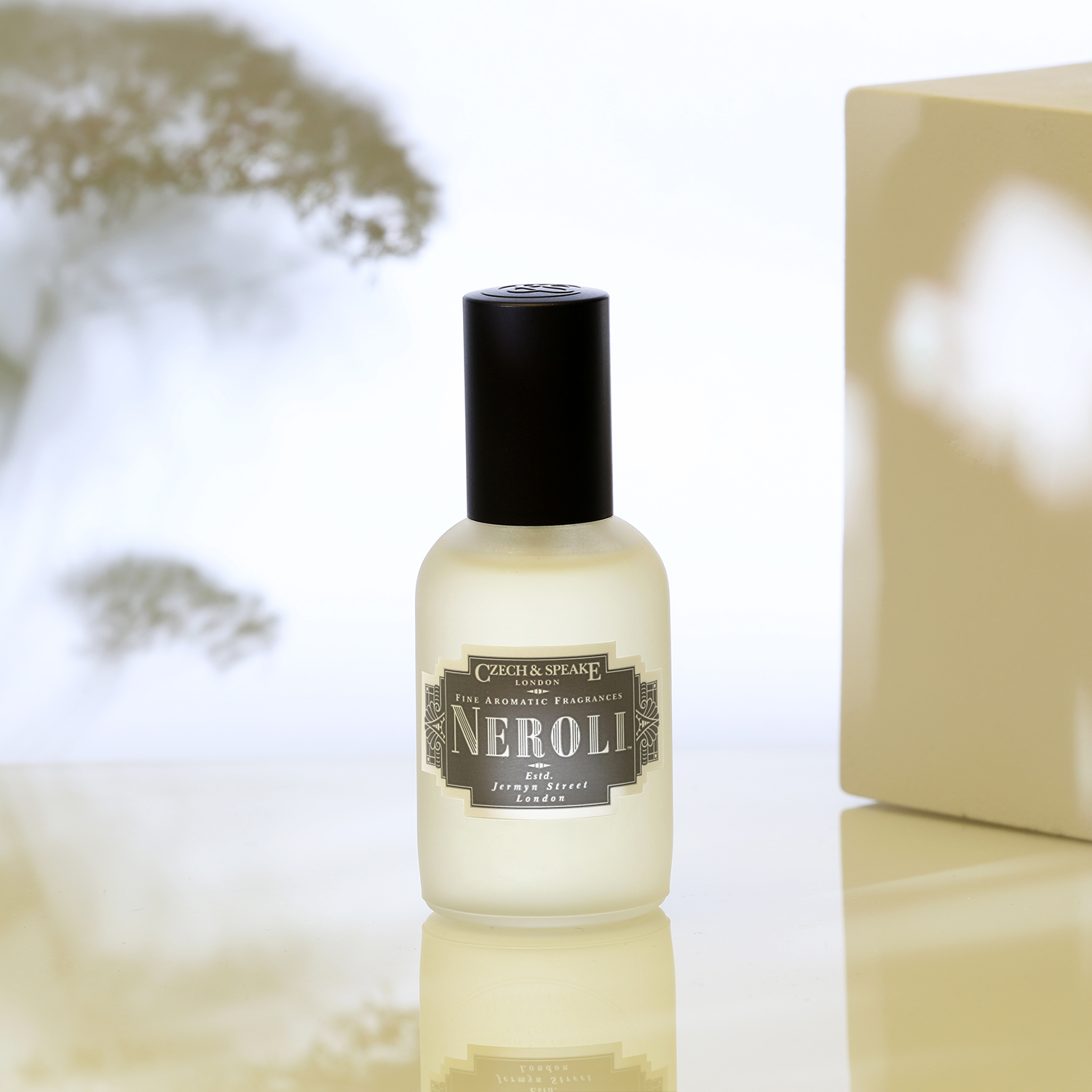 Neroli Cologne 50ml on floral background with white block