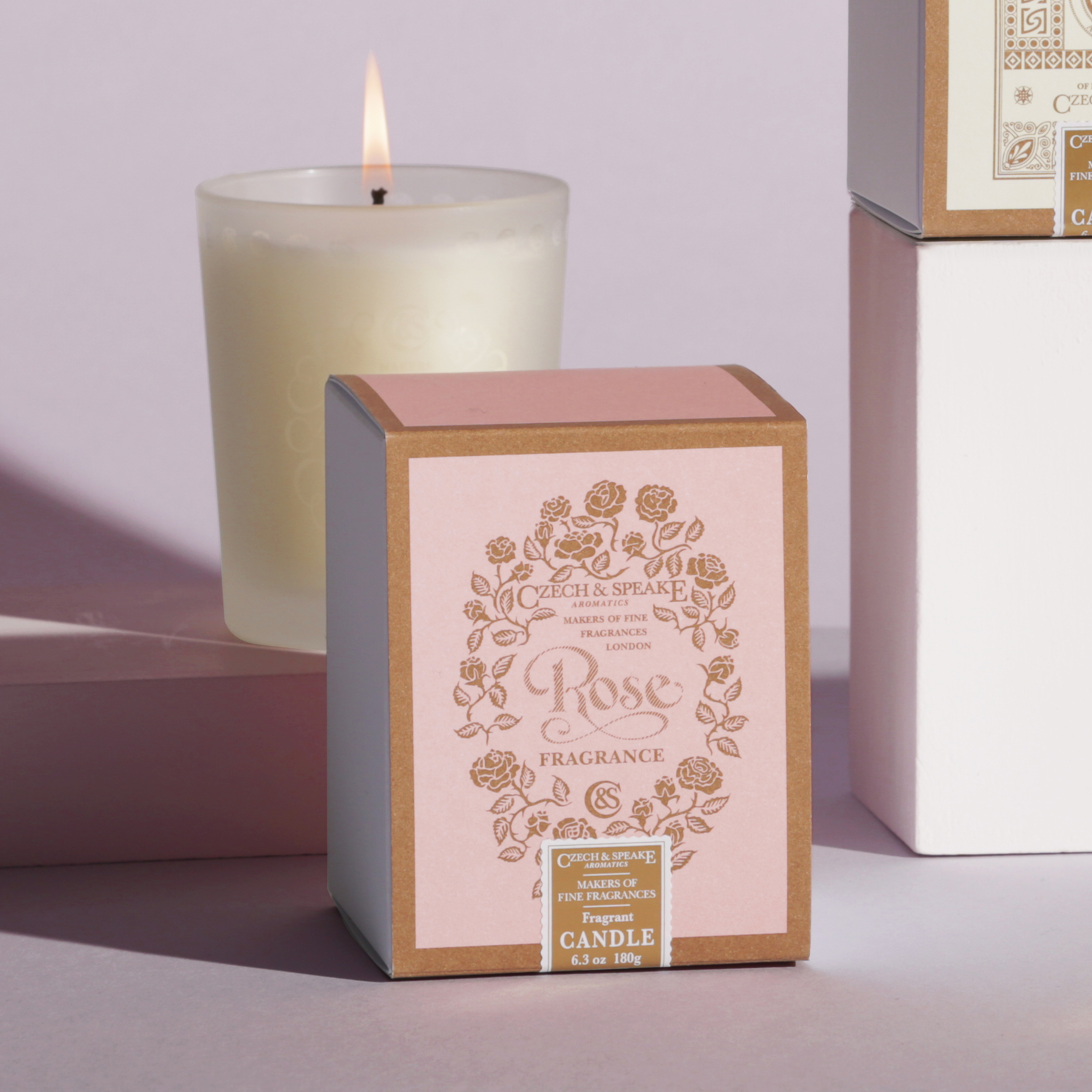 Czech & Speake Rose Candle with packaging on pink background